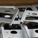 Laser Cut And Metal Formed .063" Aluminum Brackets With PEM® Nuts Installed